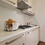 Homely With Swimming Pool In A Village Appartamento Bibione
